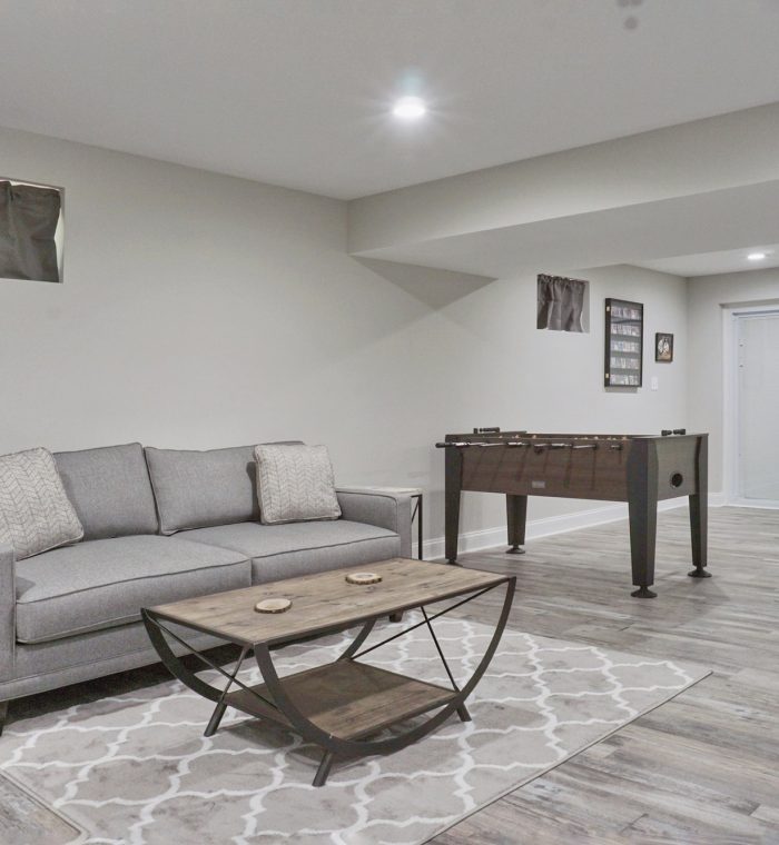 Large basement with a modern interior design in bright lighting
